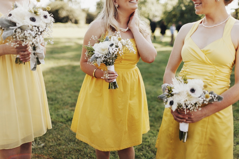 yellow bridesmaids dresses for the spring by heather elizabeth photography