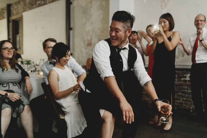 hilarious wedding photography at a wedding at firehouse 8 by heather elizabeth photography