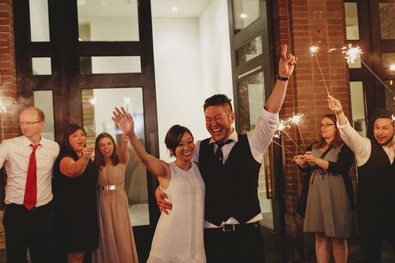 sparkler exit after a wedding in front of firehouse 8 in san francisco by heather elizabeth photography