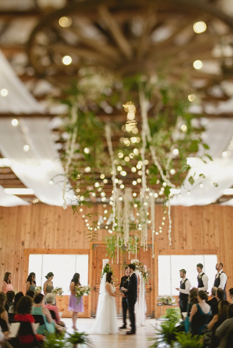 Organic free lush floral arrangement at a Christian wedding at the WIlliams Barn in San Marcos by Heather Elizabeth Photography