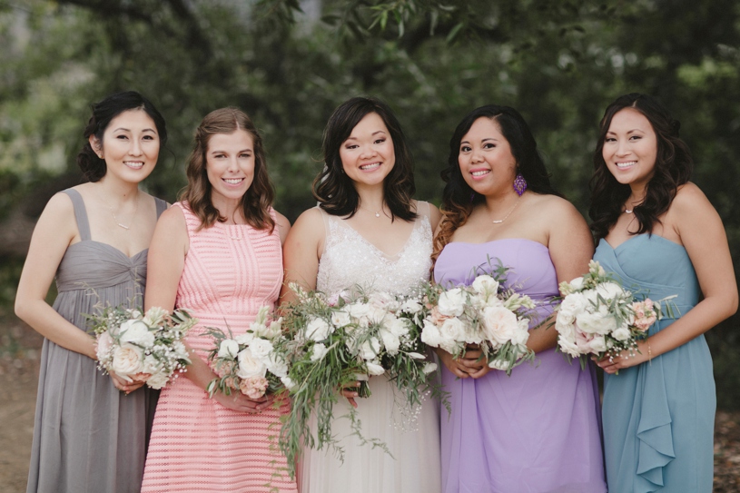 pastel colored bridesmaids dresses at a summer wedding in San Carlos California by Heather Elizabeth Photography