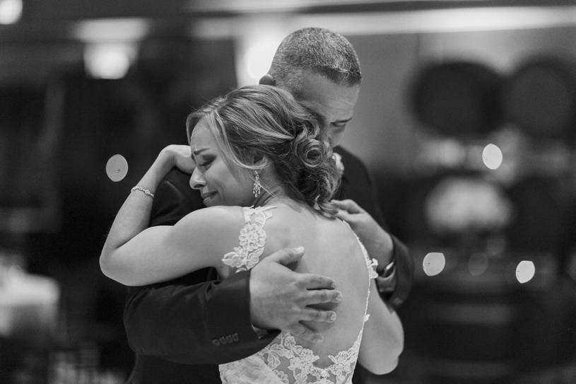 father daughter dance at a wedding reception at the palm event center by Heather Elizabeth Photography