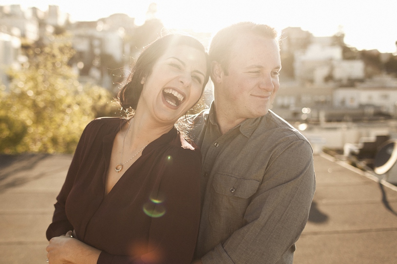 candid natural and fun engagement session on a roof top in San Francisco by Heather Elizabeth Photography