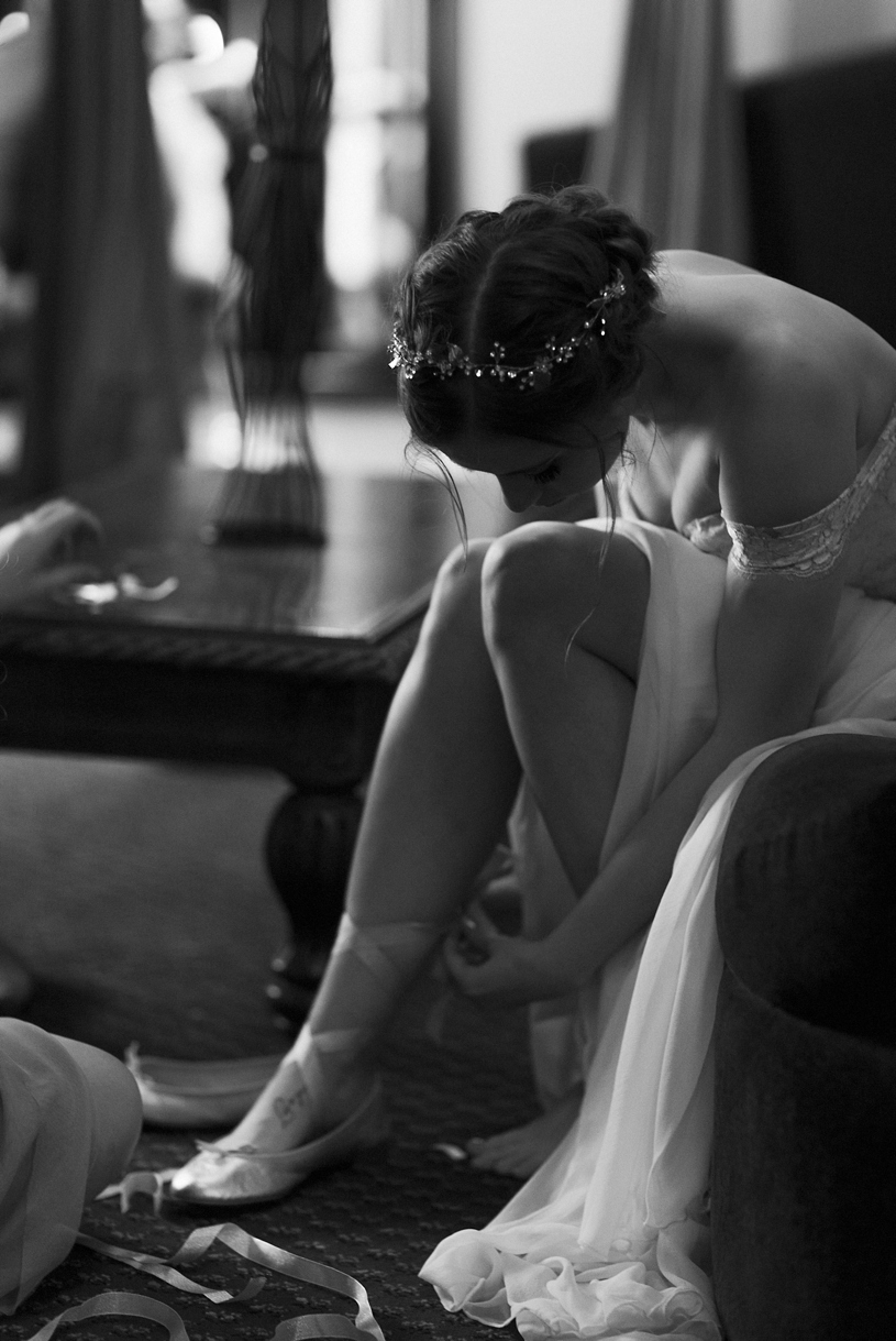 Bride wearing ballerina shoes on her wedding day at the Forest House Lodge in Foresthill by Heather Elizabeth Photography 