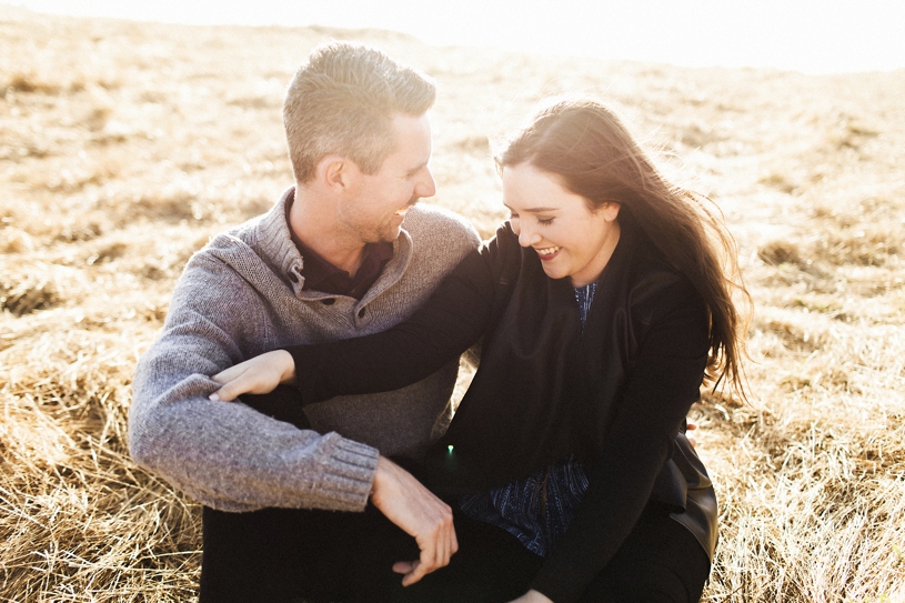 Sunset windy engagement session at the Concord Coastline by Heather Elizabeth Photography