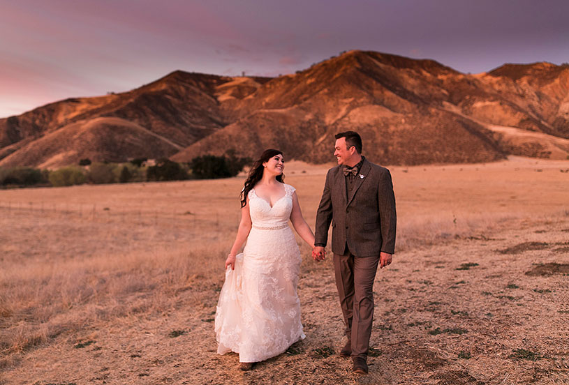 A sunset portrait session for a bride and groom at their Up! Themed country wedding at the Bar Z Ranch by Heather Elizabeth Photography