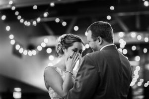 An emotional wedding moment between a couple during their first dance in calistoga california by heather elizabeth photography